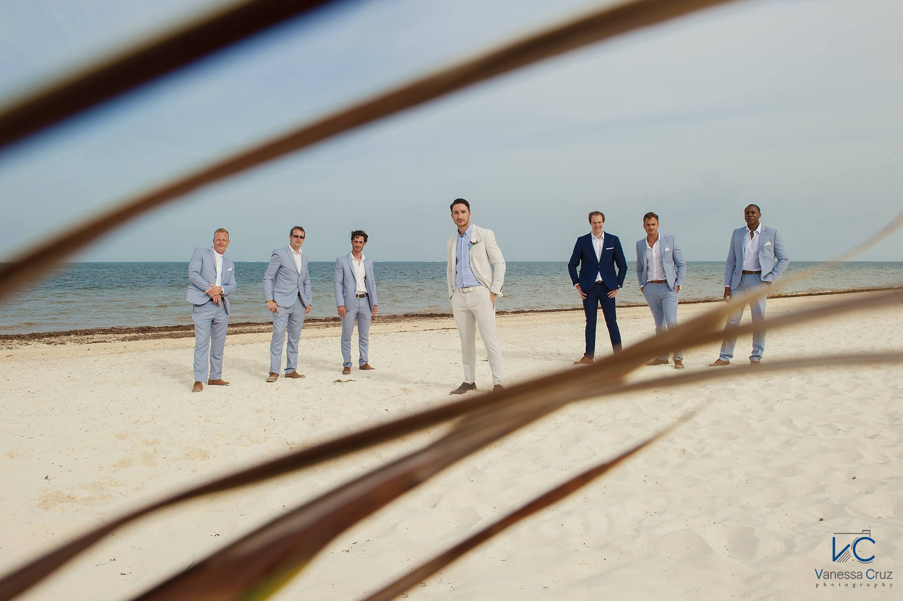 Groom and groomsman creative portrait Cancun Mexico