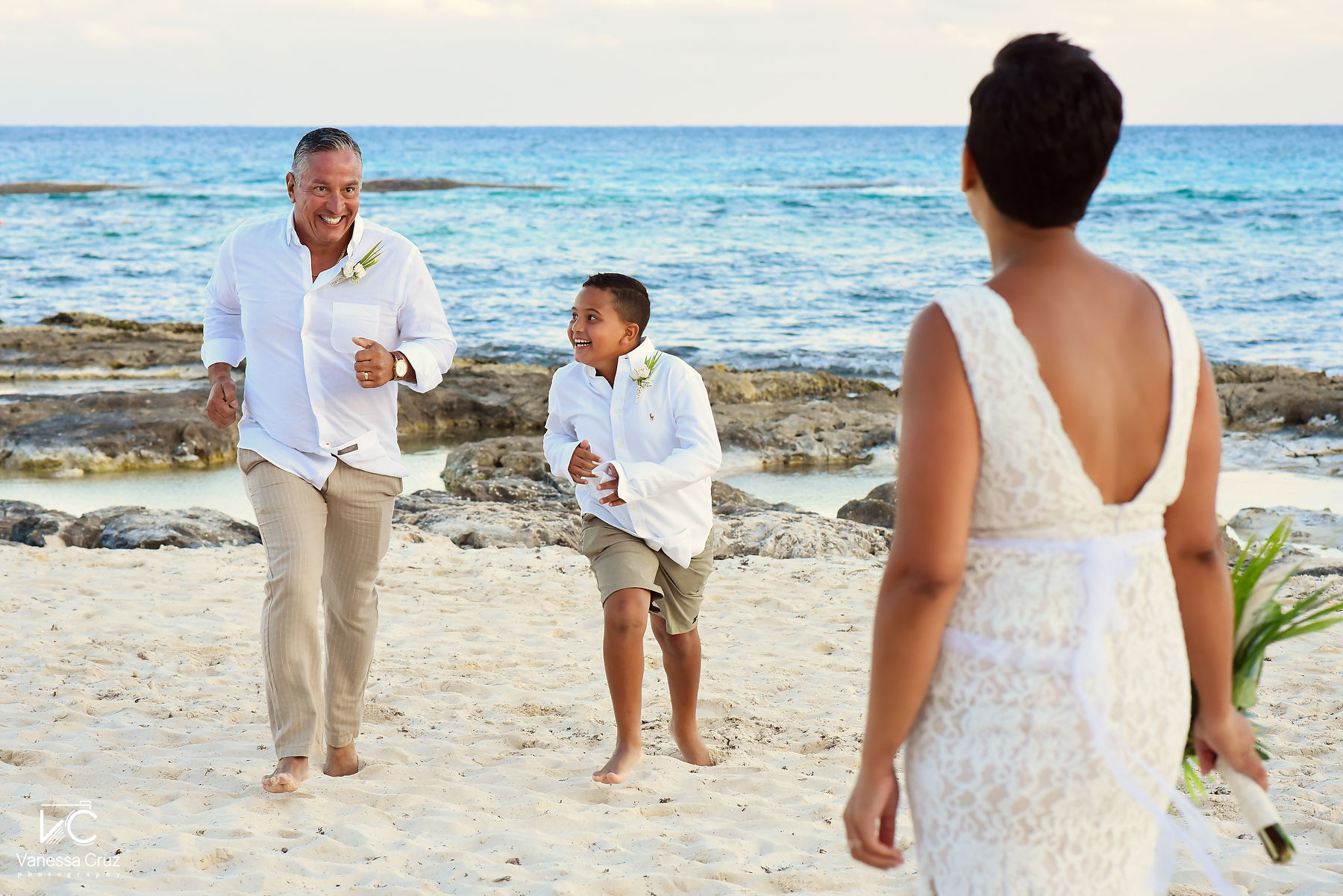 Groom and son wedding moments Destination Vow Renewal Wedding  Mayan Palace Riviera Maya Mexico