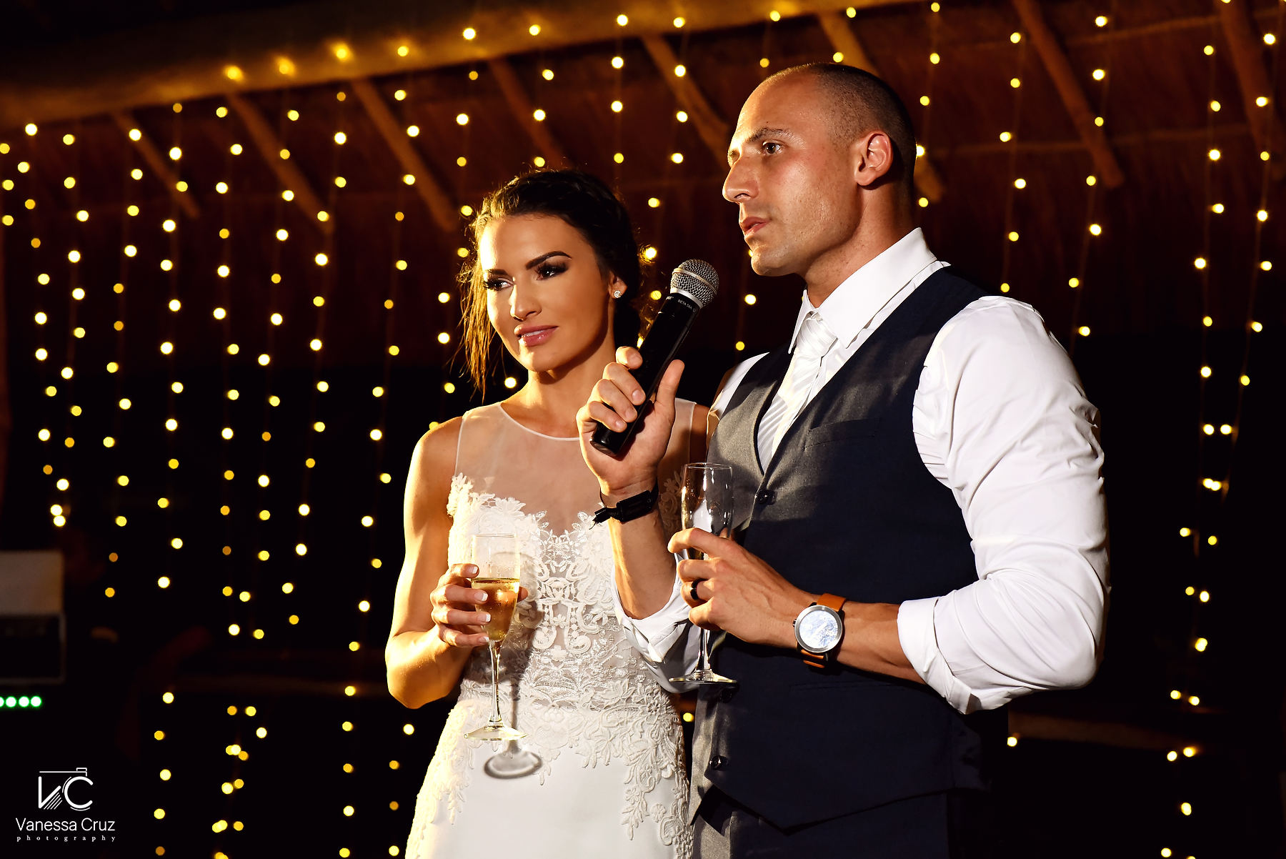 Bride and groom wedding toast Blue Venado Playa del Carmen