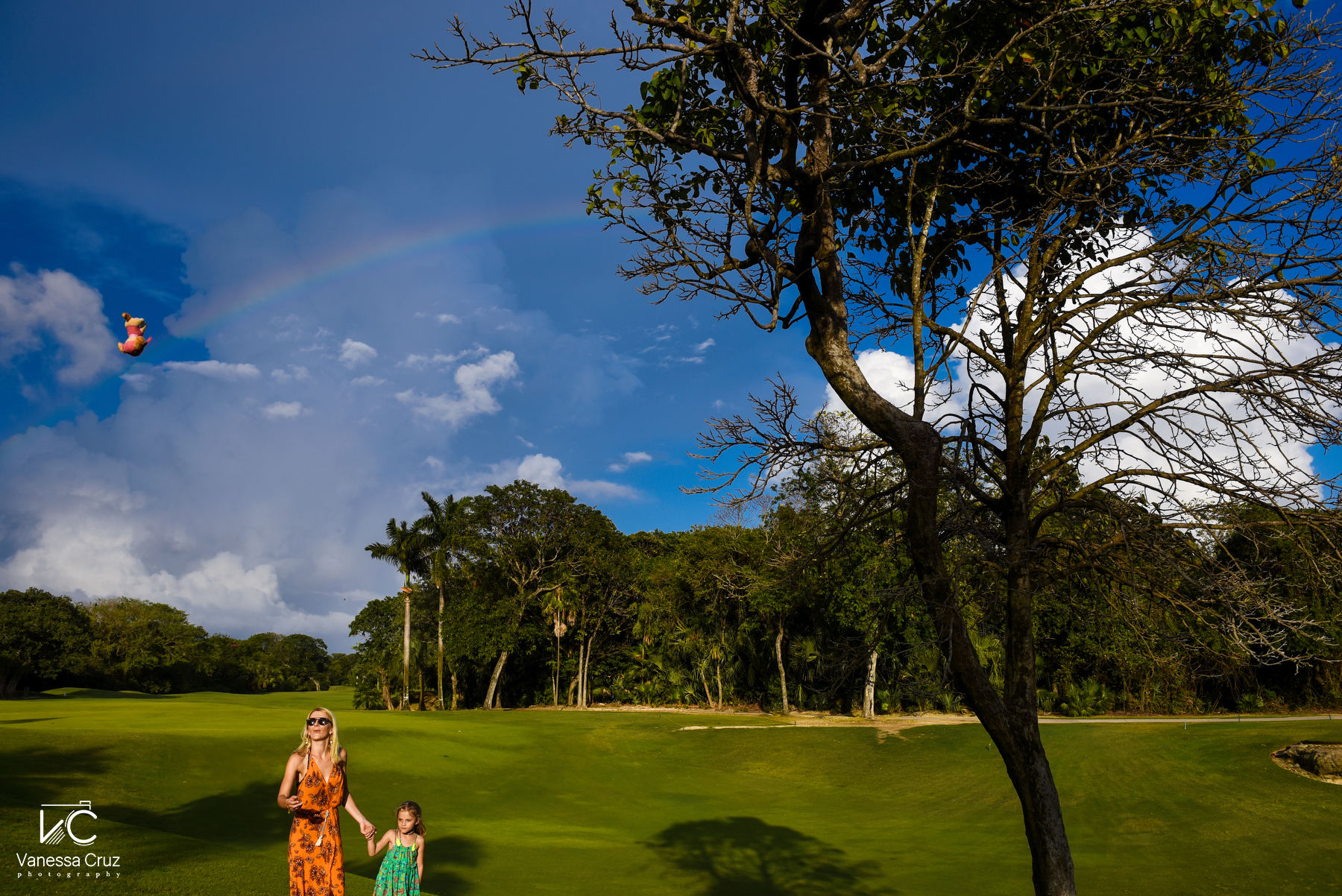 documentary family portrait with rainbow Playacar Mexico