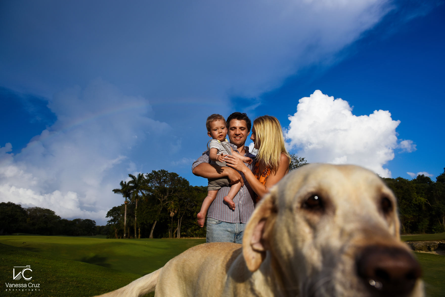 Dog and family playing Playa del Carmen Mexico