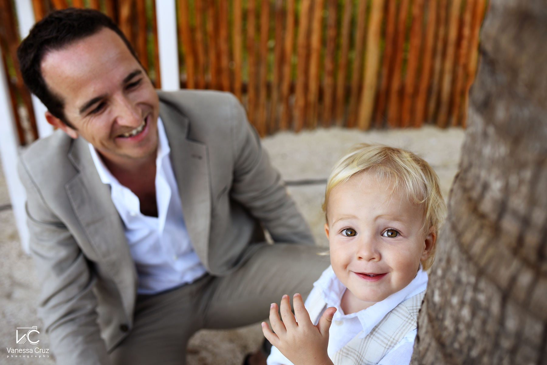 Kid smiling to camera beach wedding blue Venado Riviera Maya 