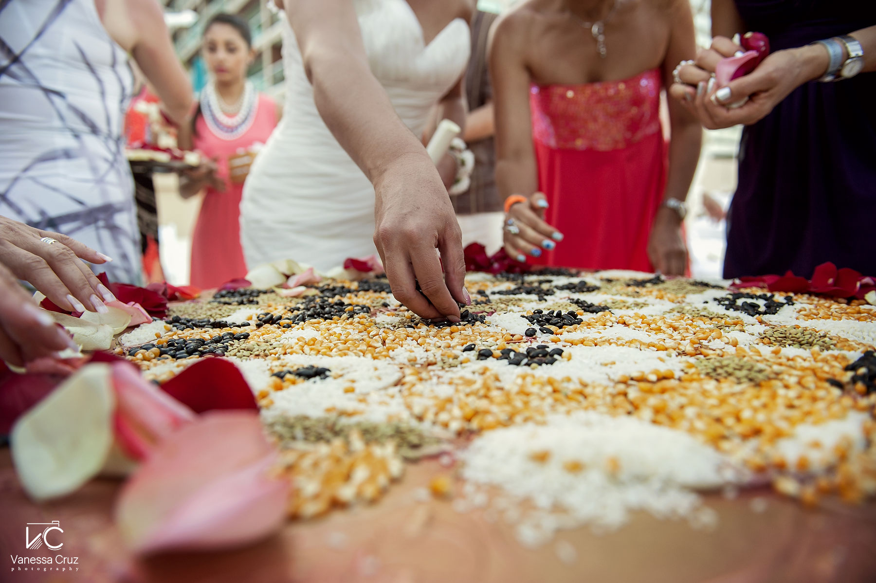 bride offering seed Wedding Ceremony Cancun Mexico