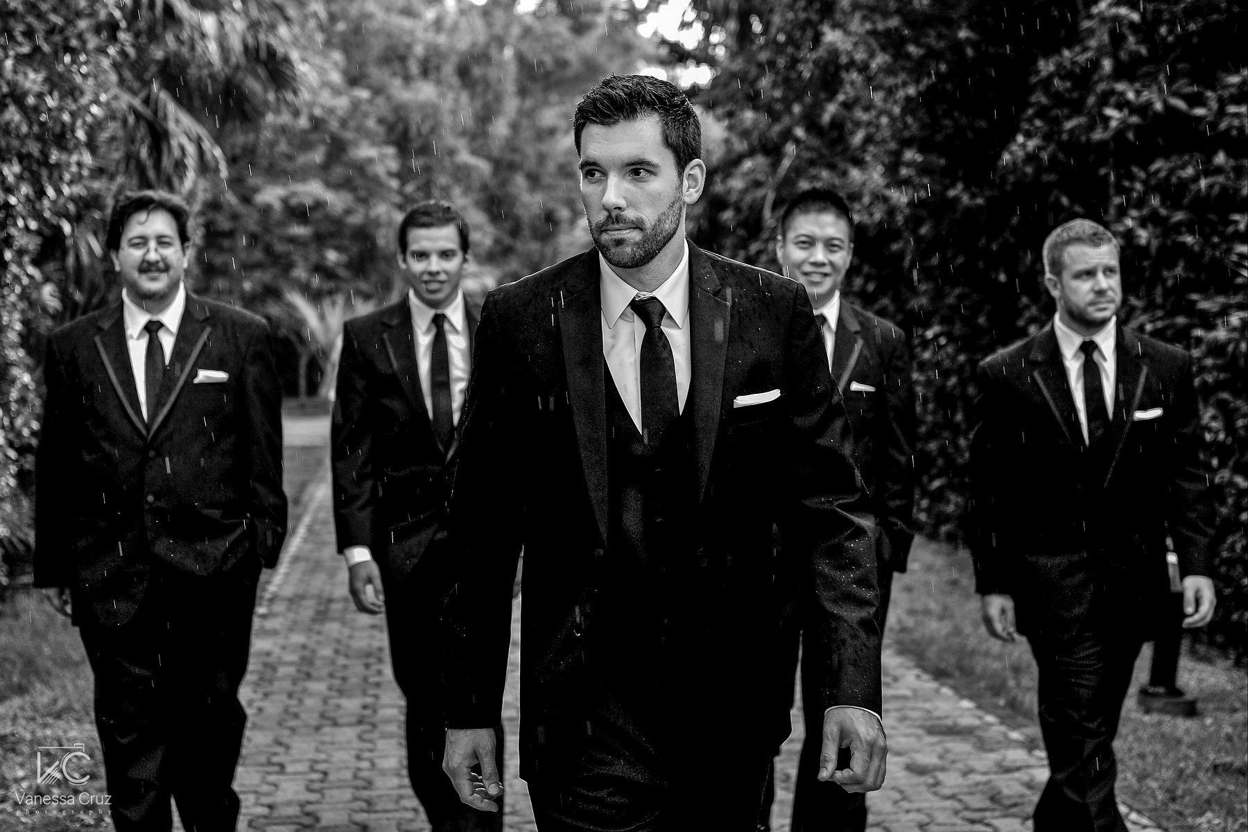 Groom and groomsman black and white wedding photography