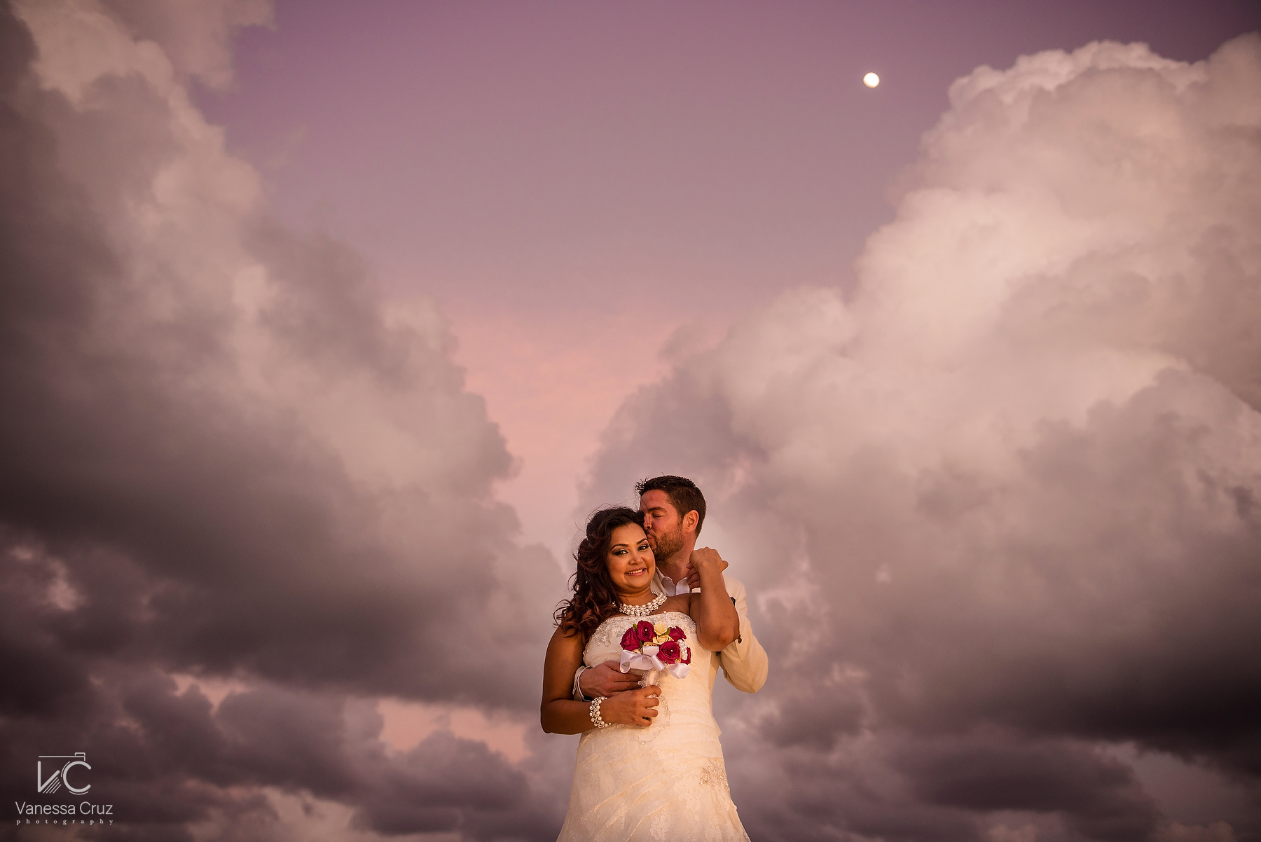 Beautiful sky beach wedding portrait Cancun Mexico